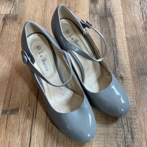 Gray faux patent leather ankle strap heels
